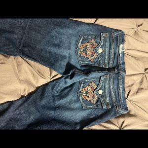 Flare jeans with detail on back pockets